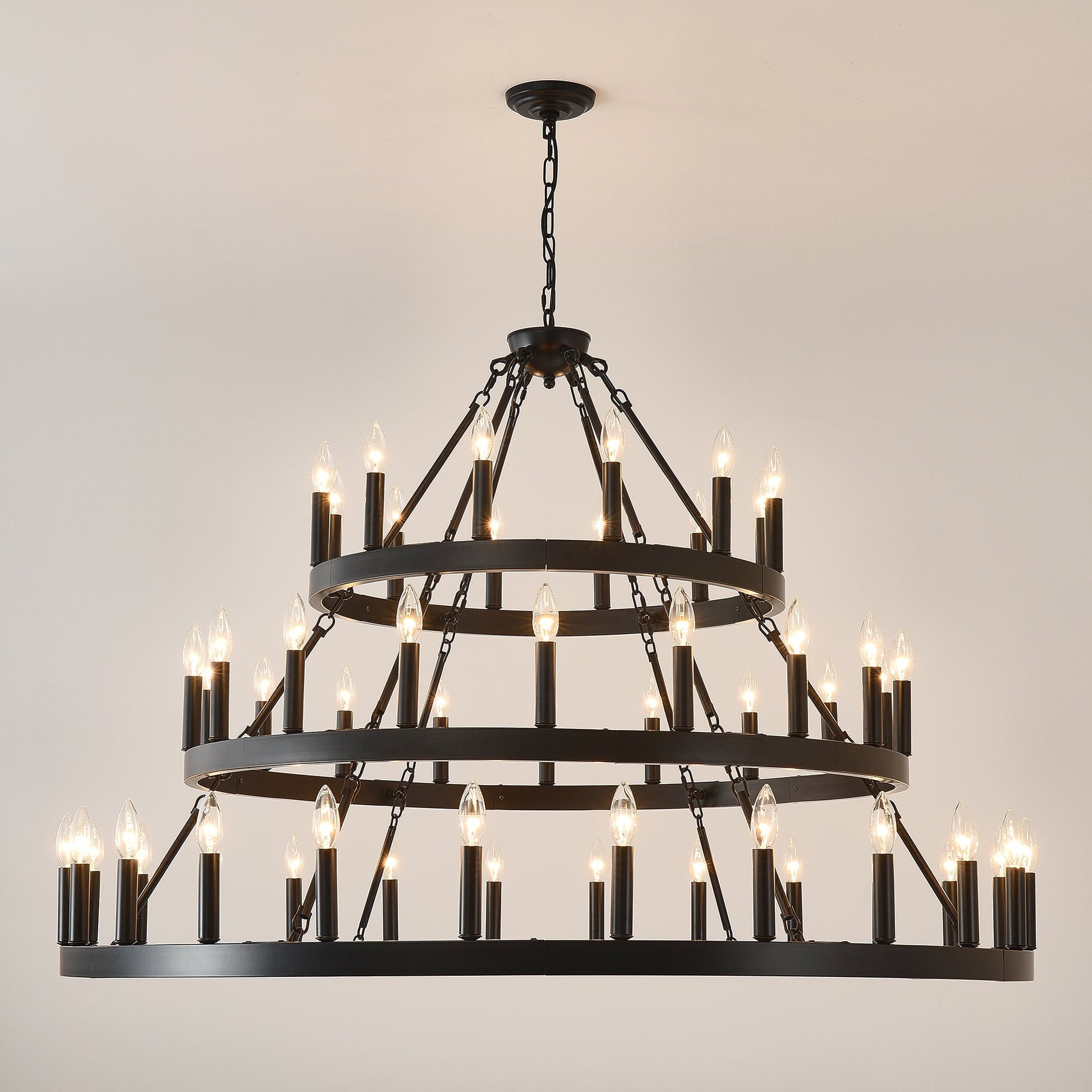 Chandelier 39.37 inch 3-tier wagon wheel in black metal with candle bulbs on Tampa Home & Garden Store