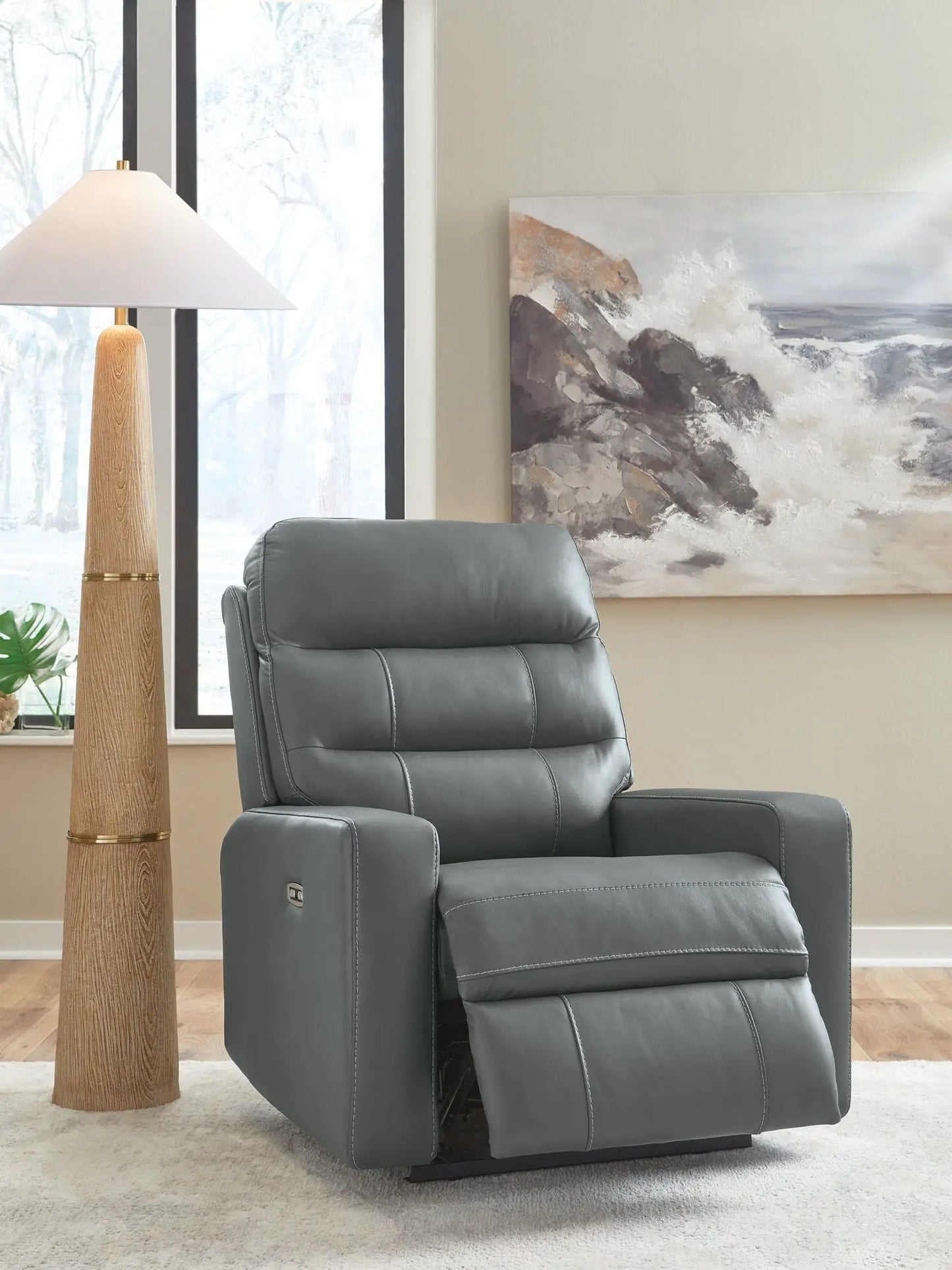 Pennacle Pier power recliner with adjustable headrest in gray leather upholstery on Tampa Home & Garden Store
