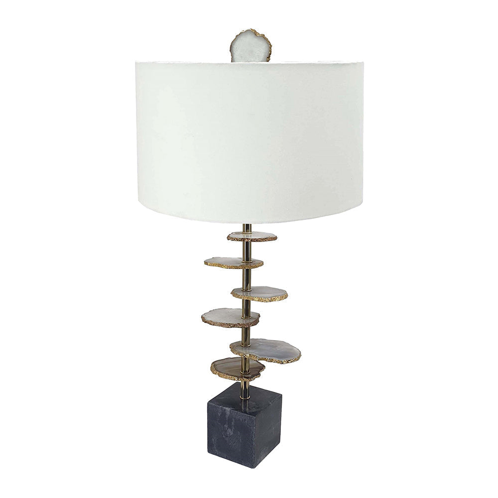 Smoke agate-slice table lamp with white drum shade atop brass stem and a marble base on Tampa Home & Garden Store