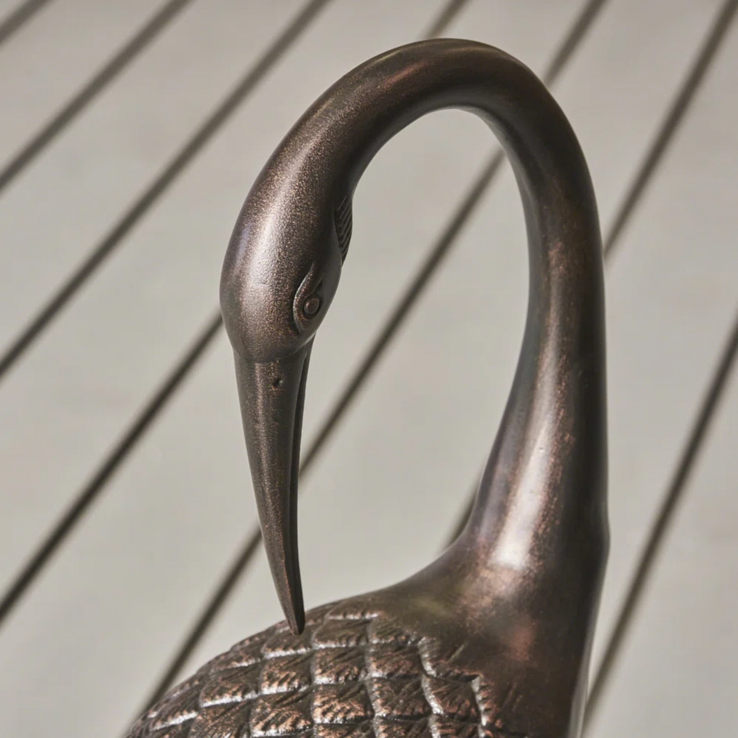 Crane outdoor decor statue by HouseOfZazla in a dark bronze finish with curved neck on Tampa Home & Garden Store