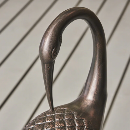 Crane outdoor decor statue by HouseOfZazla in a dark bronze finish with curved neck on Tampa Home & Garden Store