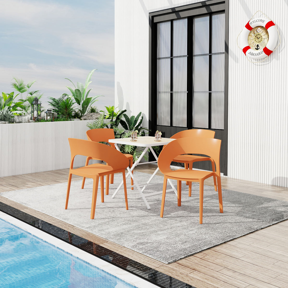 Orange 4-piece outdoor dining set with folding white table and four chairs beside a pool on Tampa Home & Garden Store