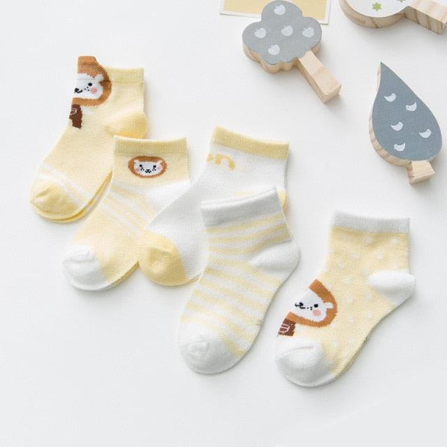 Baby socks 5-pair set in pastel yellow/cream and white with animal faces and stripes on Tampa Home & Garden Store