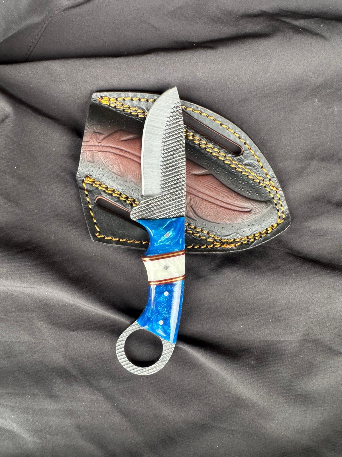 Titan Sapphire Hook Hawkbill Skinner knife with blue pearl handle and textured RASP steel blade on Tampa Home & Garden Store