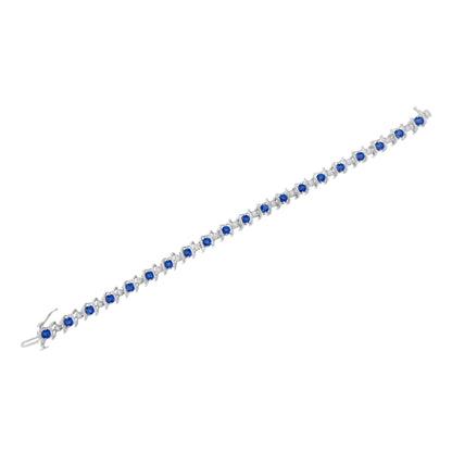 Sterling silver tennis bracelet with lab-grown blue sapphires and 4 Cttw diamonds on Tampa Home & Garden Store