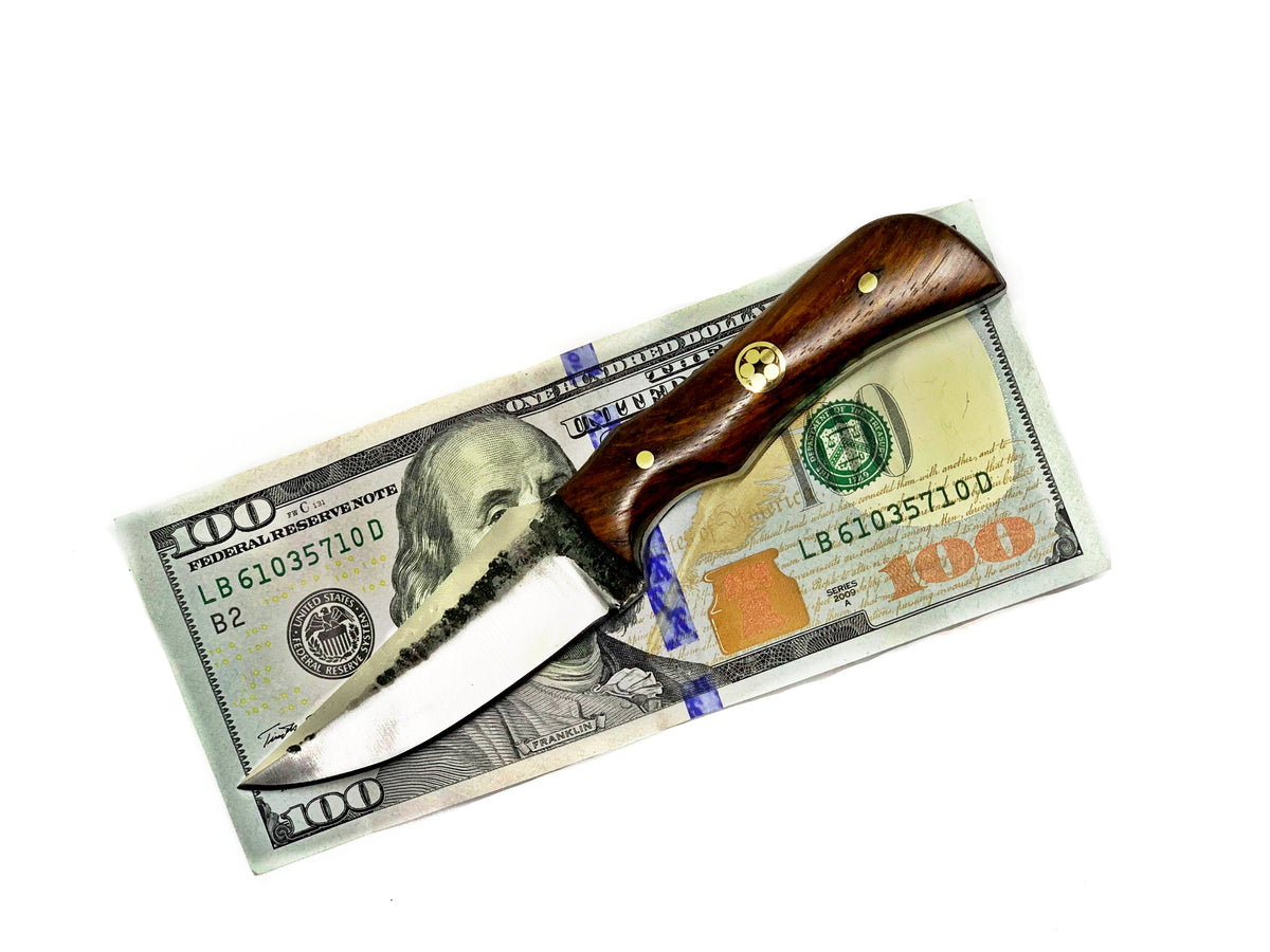E3 Carbon neck knife with rosewood grip and forged scales atop $100 bills on Tampa Home & Garden Store