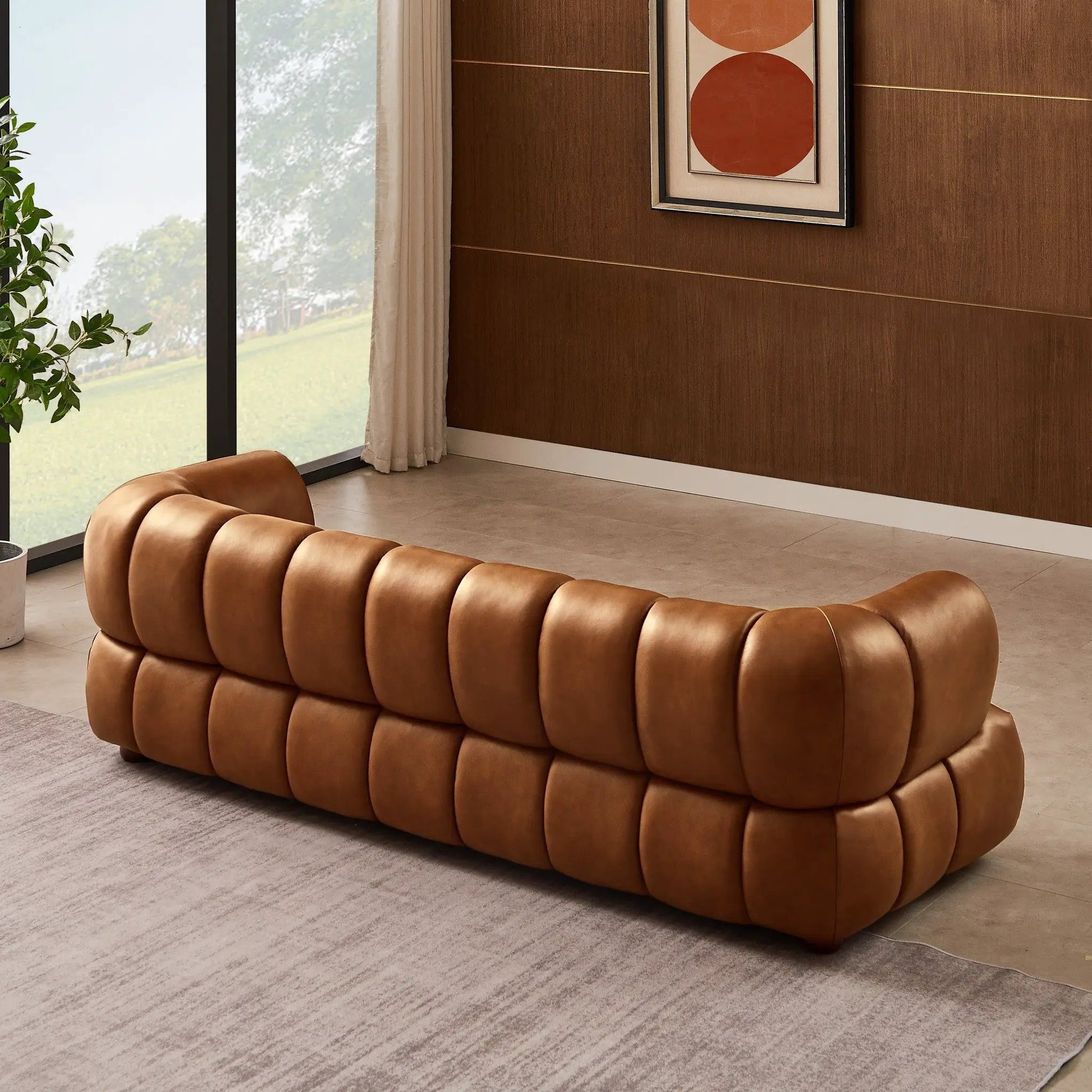 Jasmin Elegant Upholstered Sofa, stationary caramel leather with tufted rounded segments on Tampa Home & Garden Store