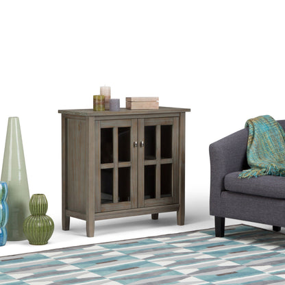 Warm Shaker handcrafted low storage cabinet with glass-pane doors and weathered wood finish on Tampa Home & Garden Store