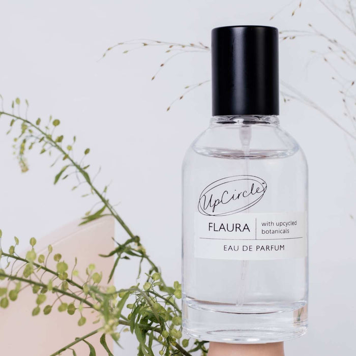 UpCircle Flaura Eau de Parfum bottle with black cap, clear glass and minimalist label on Tampa Home & Garden Store