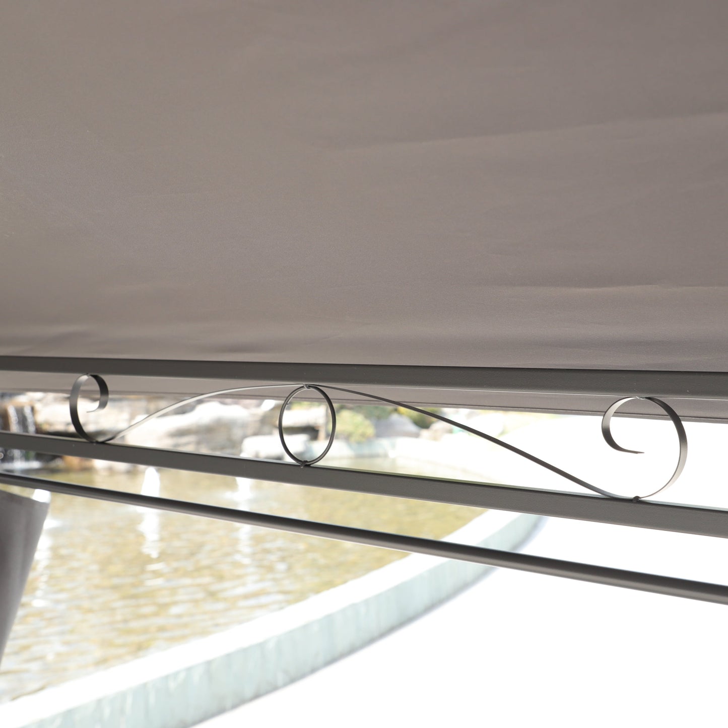 Gazebo canopy interior in grey fabric with circular black metal rings along the frame on Tampa Home & Garden Store