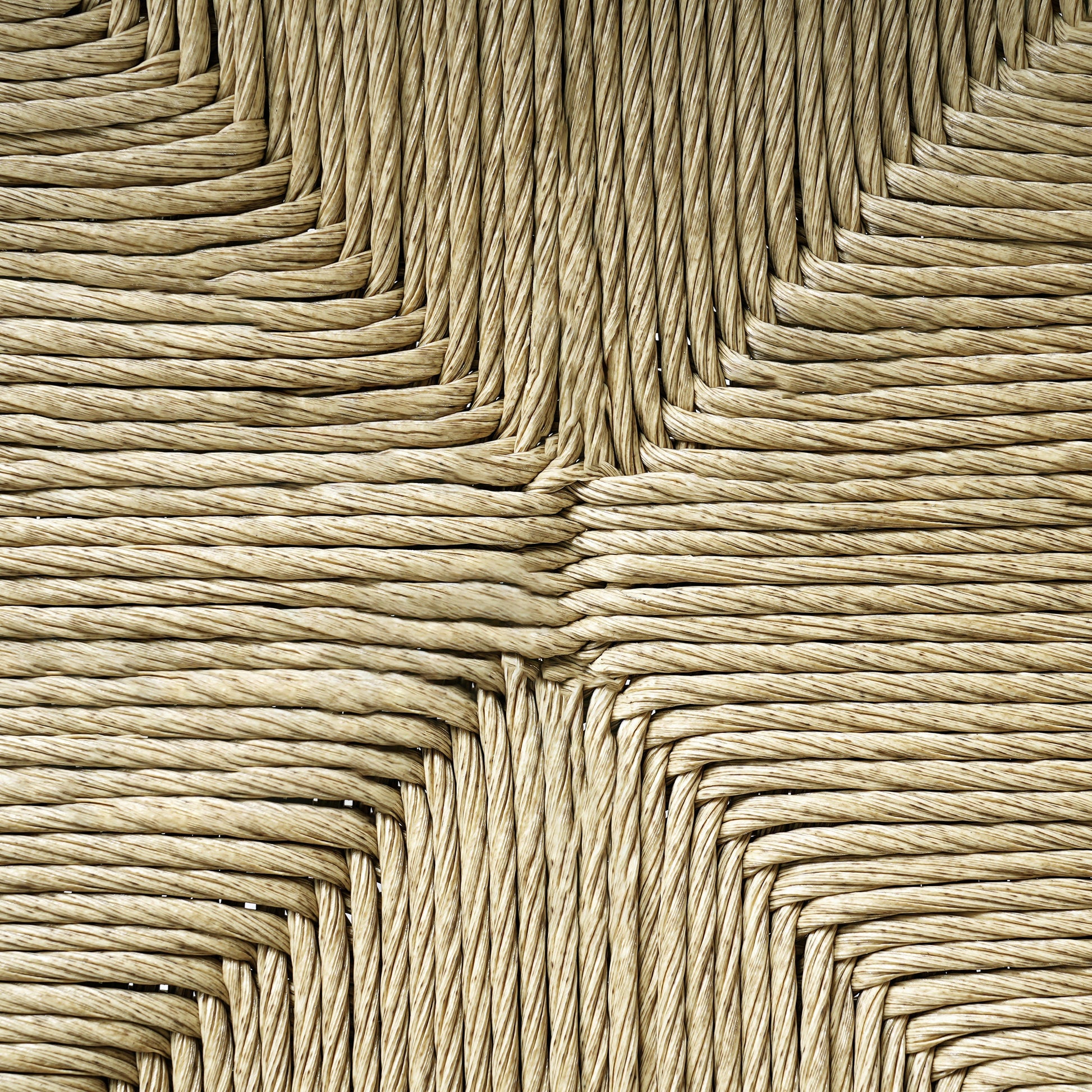 Outdoor dining chair wicker seat close-up in natural beige fibers on Tampa Home & Garden Store