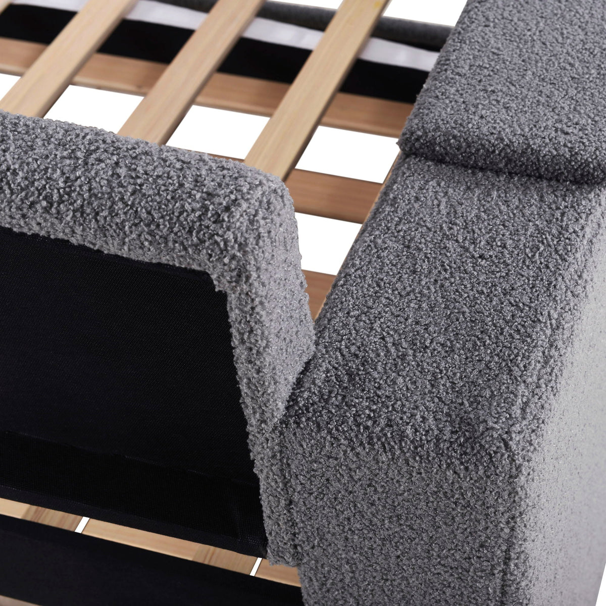 Upholstered daybed with gray boucle cushions and wooden slat frame on Tampa Home & Garden Store