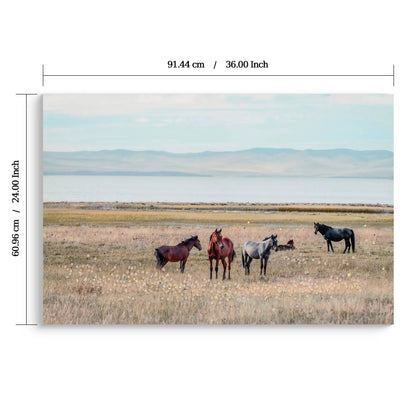 Horse framed canvas wall art in denim brown featuring a herd grazing in a wide meadow with distant mountains on Tampa Home & Garden Store