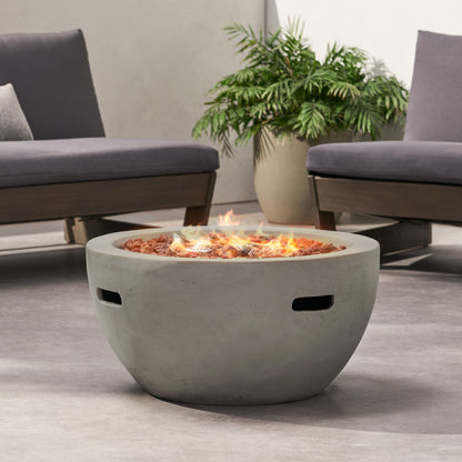 HouseOfZazla 27' bowl-shaped MGO fire pit, lava rocks visible, light grey on Tampa Home & Garden Store