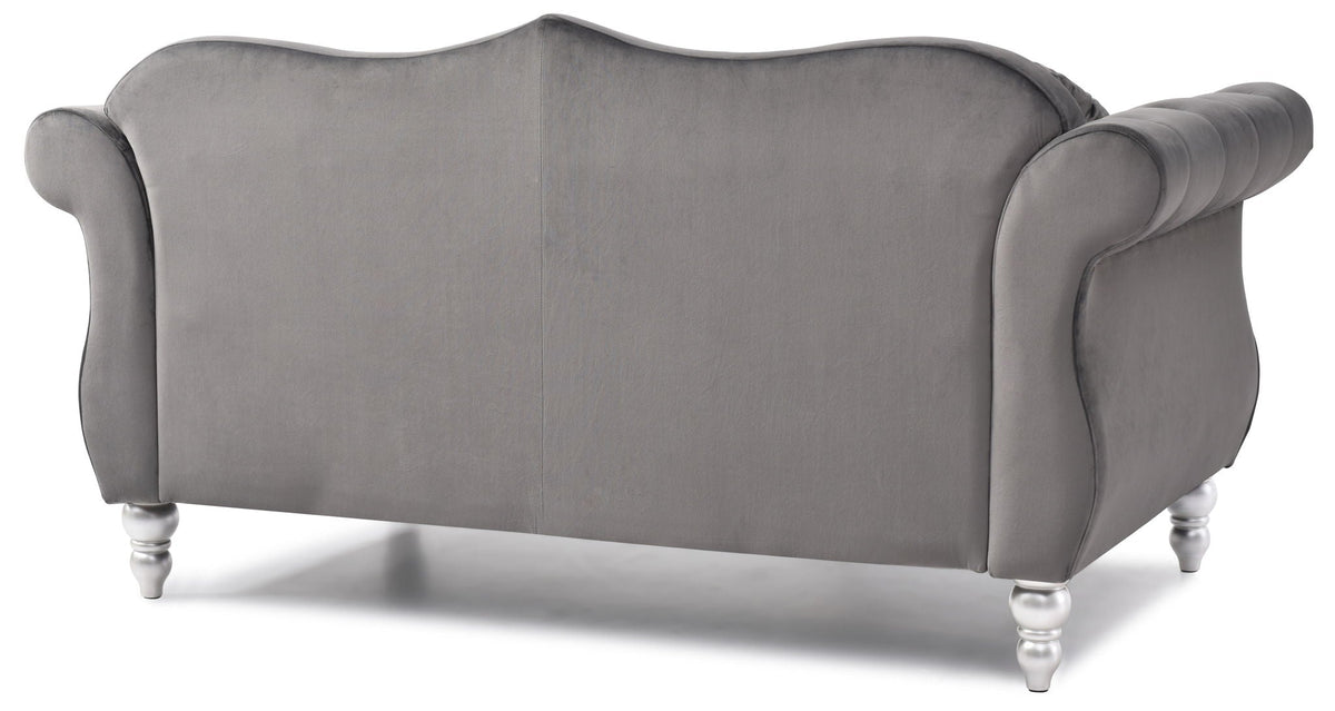 Stylish flared-arm loveseat in gray velvet with curved arms and silver turned legs on Tampa Home & Garden Store