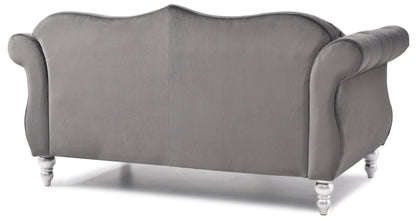 Stylish flared-arm loveseat in gray velvet with curved arms and silver turned legs on Tampa Home & Garden Store