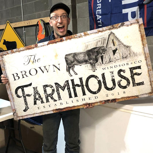 Rustic Farmhouse Sign Canvas with beige distressed finish and bold FARMHOUSE lettering on Tampa Home & Garden Store