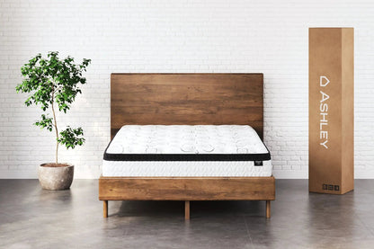 Chime 12 Inch Hybrid Ultra Plush Mattress on a dark wood bed with white quilted cover on Tampa Home & Garden Store