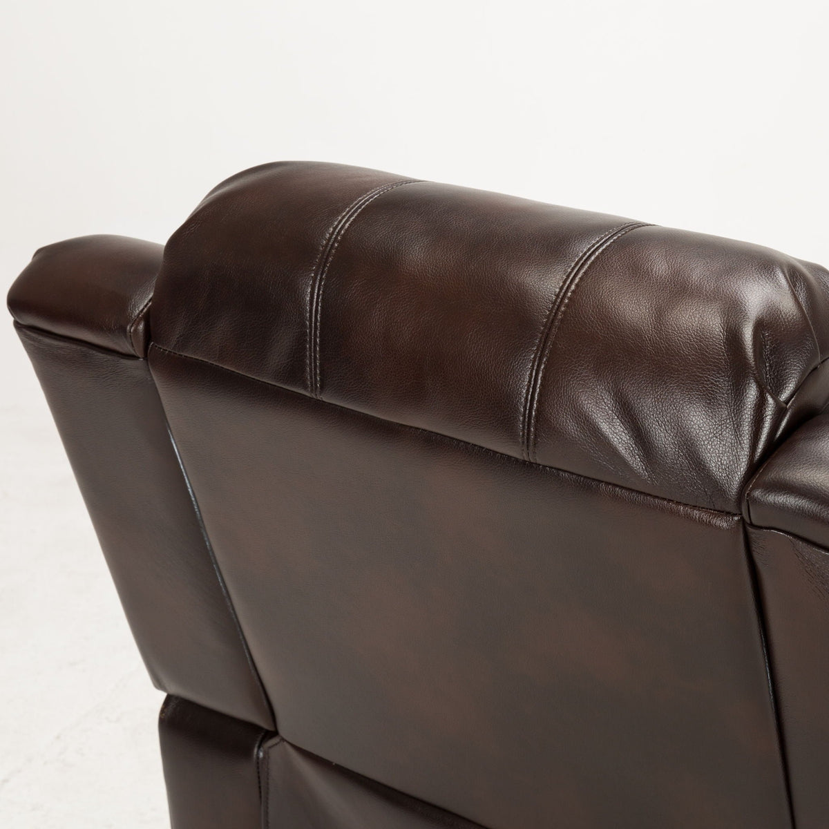Charlotte Glider Recliner in brown leather with visible stitching by HouseOfZazla on Tampa Home & Garden Store