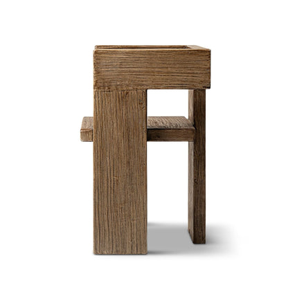 Sculptural block arm chair in reclaimed elm with a brown finish and chunky square legs on Tampa Home & Garden Store