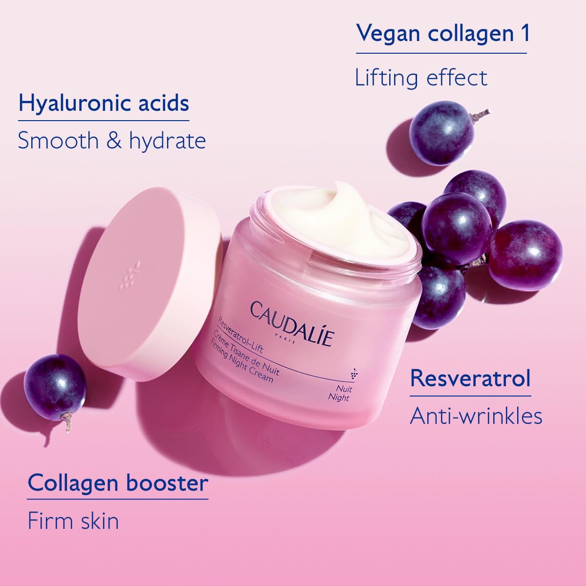 Caudalie Resveratrol Lift Firming Night Cream jar in pink with open lid, grapes around on Tampa Home & Garden Store