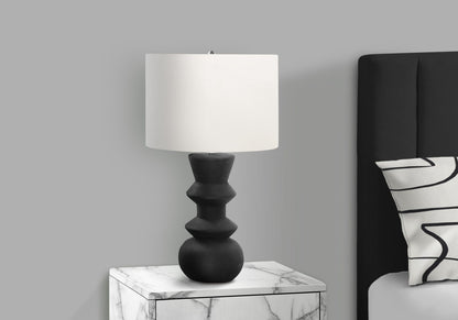 HouseOfZazla table lamp with black stacked base and white shade on marble nightstand on Tampa Home & Garden Store