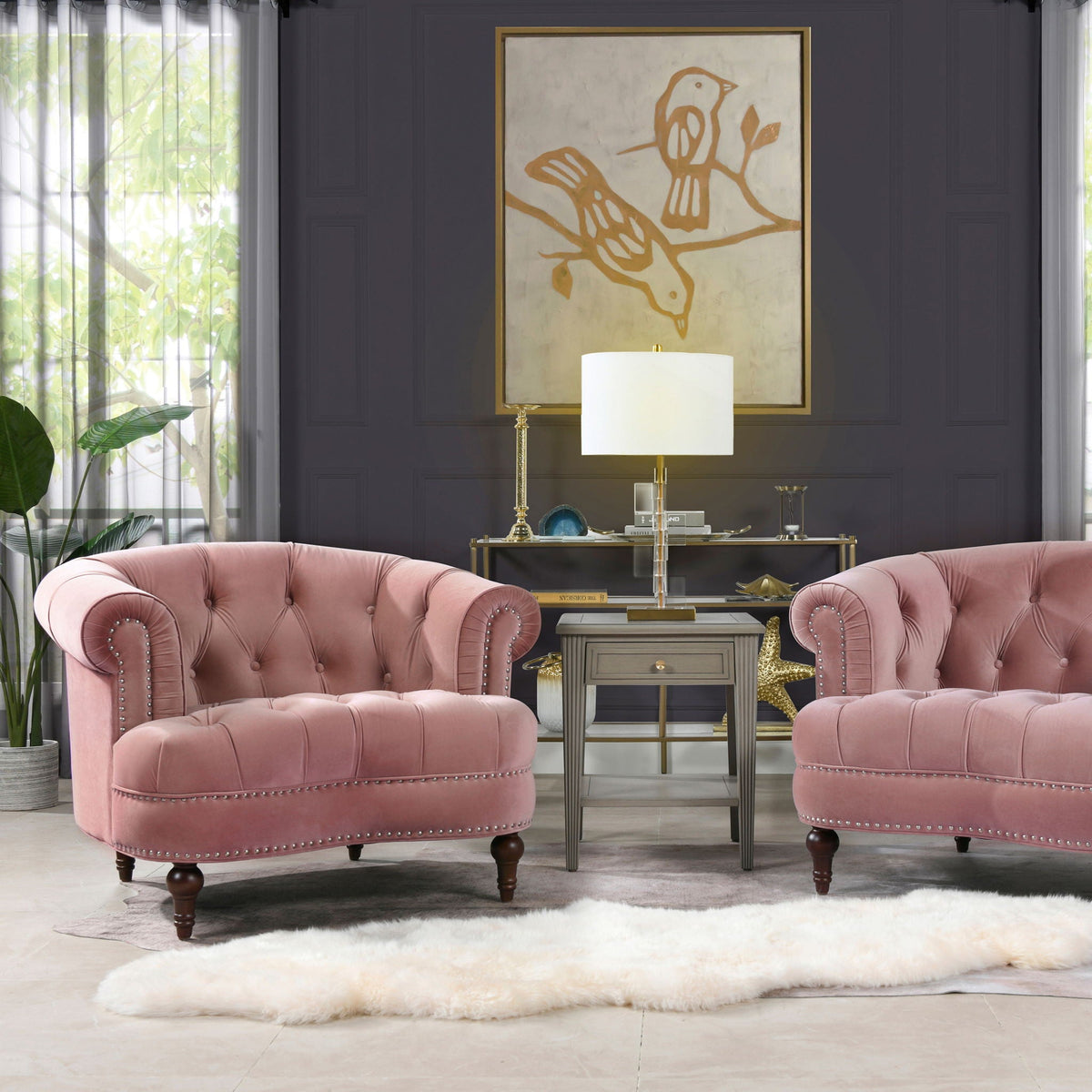 Pair of pink velvet Victorian tufted accent chairs with nailhead trim on dark wood legs on Tampa Home & Garden Store