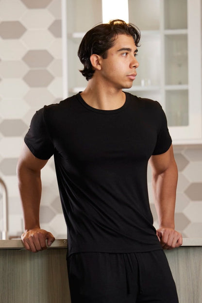 Men's Soft Bamboo Lounge Short Sleeve T-Shirt by Spun Bamboo in black worn by a man on Tampa Home & Garden Store