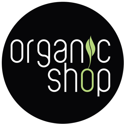 Exfoliator logo for Organic Shop Lychee & Bubble Gum Body Scrub on a black circular badge with white lettering and a green leaf on Tampa Home & Garden Store