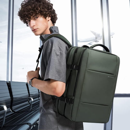 Expandable travel backpack 26–45L Moktan Sabai, olive green, laptop-ready, BANGE logo visible on Tampa Home & Garden Store
