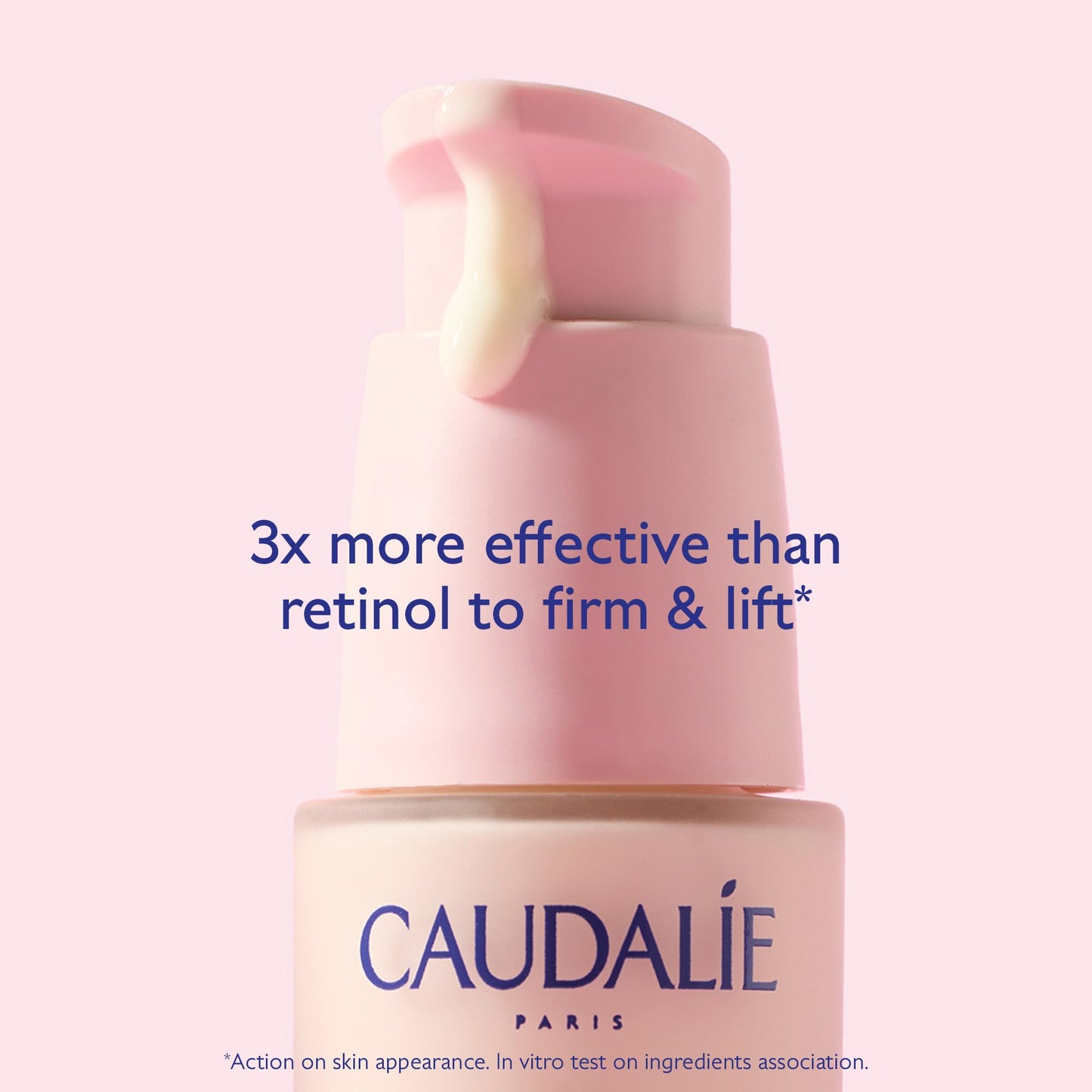 Caudalie Paris facial serum bottle with pink pump on pale pink background on Tampa Home & Garden Store
