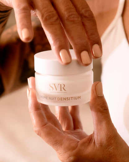 SVR Densitium night cream jar 50ml held by hands with nude nails, white frosted container on Tampa Home & Garden Store
