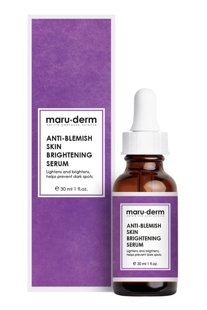 Maru-derm Anti-Blemish Skin Brightening Serum, 30 ml amber dropper bottle beside purple box on Tampa Home & Garden Store