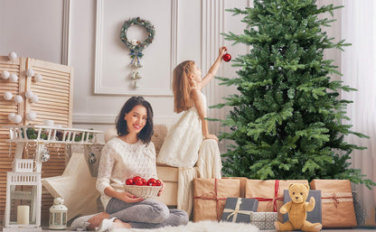 4FT Green PVC and PE Christmas Tree with 919 Tips by HouseOfZazla in a cozy living room with wrapped gifts on Tampa Home & Garden Store