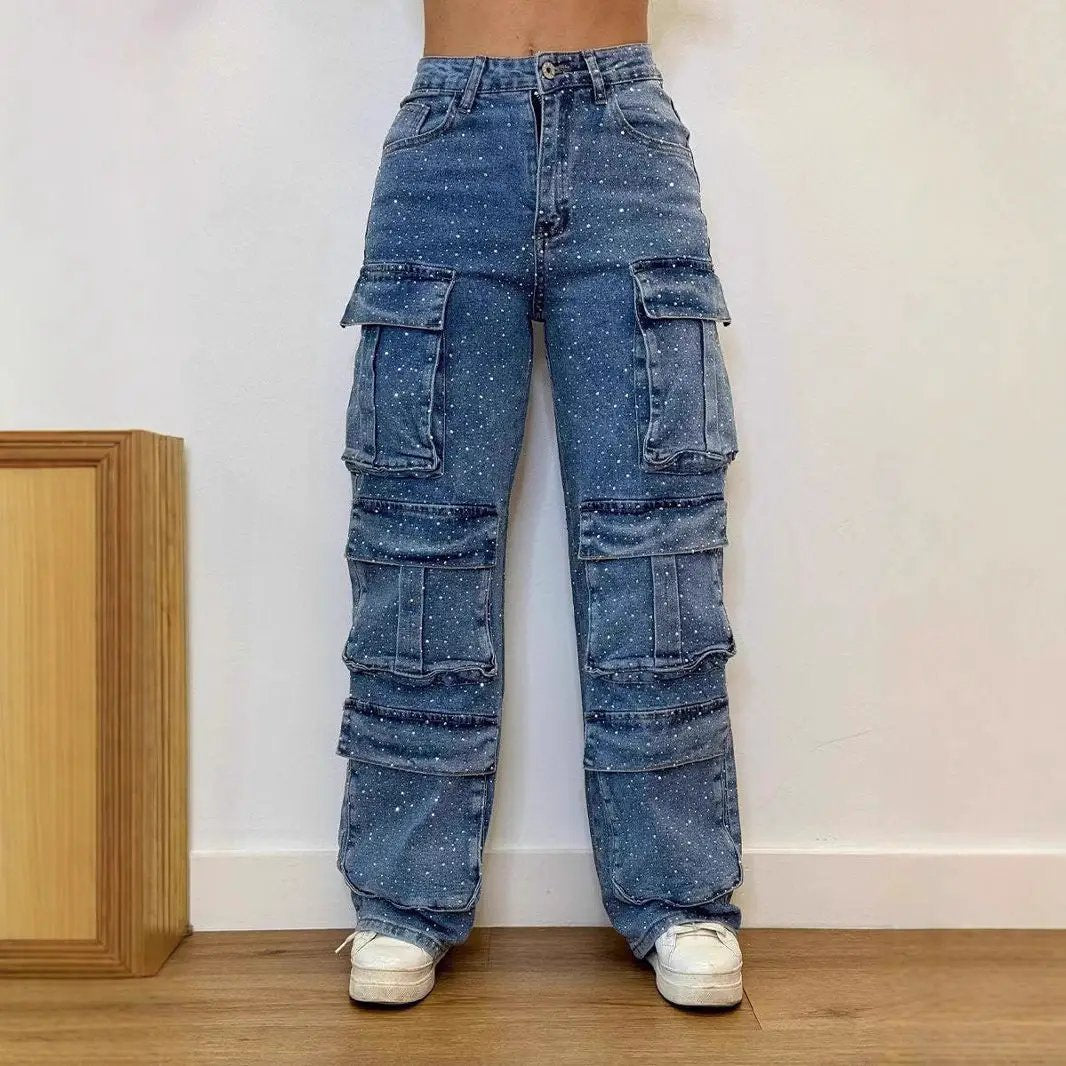 Women's blue denim cargo jeans with pockets and speckled pattern on Tampa Home & Garden Store