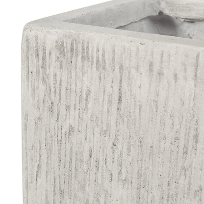 Modern outdoor planter by HouseOfZazla in concrete gray with vertical ribbed texture on Tampa Home & Garden Store
