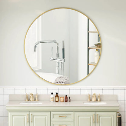 Round wall mirror with a gold metal frame for bathroom or dressing area on Tampa Home & Garden Store