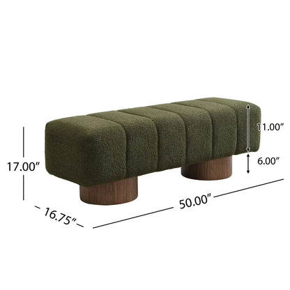 Upholstered dining bench in olive green boucle with segmented cushion and wooden pedestal legs on Tampa Home & Garden Store