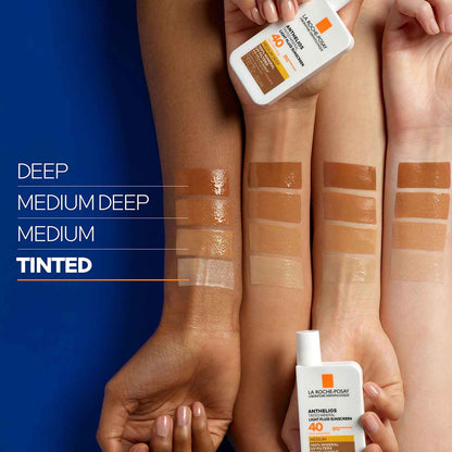 Tinted sunscreen La Roche-Posay Anthelios SPF 50+ shown with four shade swatches on arms on Tampa Home & Garden Store