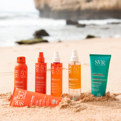 SVR Sun Secure SPF50+ sunscreen bottles (5) and teal tube on sandy beach on Tampa Home & Garden Store