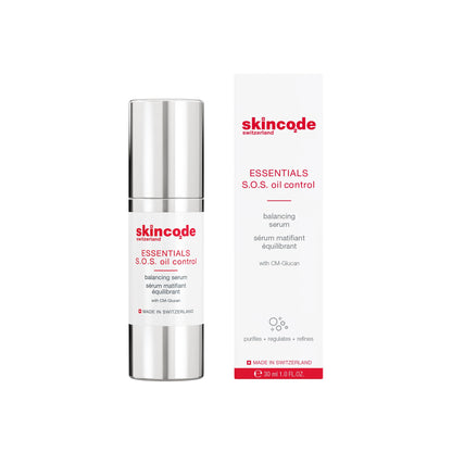 Skincode S.O.S oil control balancing serum bottle with silver cap beside white box bearing red Skincode logo on Tampa Home & Garden Store
