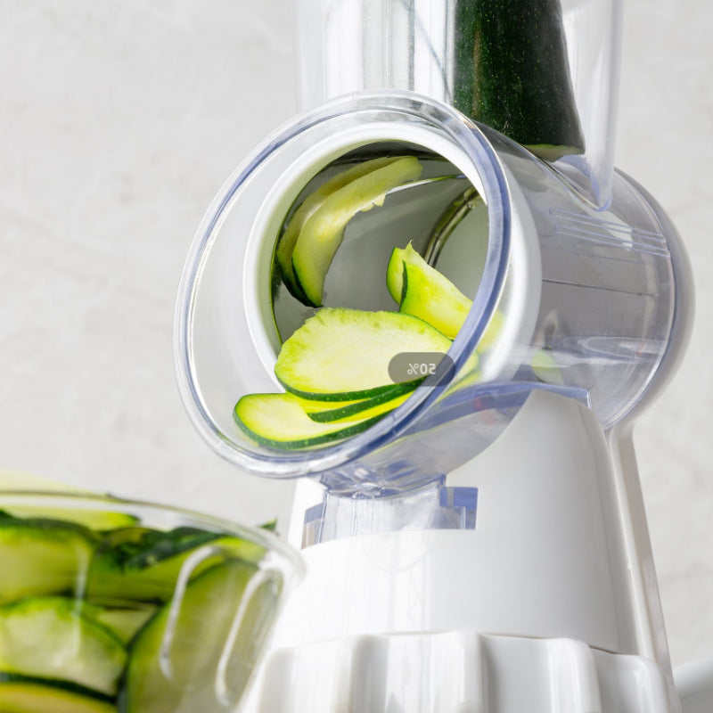 Perfecsy 3-in-1 vegetable slicer with clear round chamber and white base, zucchini slices visible on Tampa Home & Garden Store