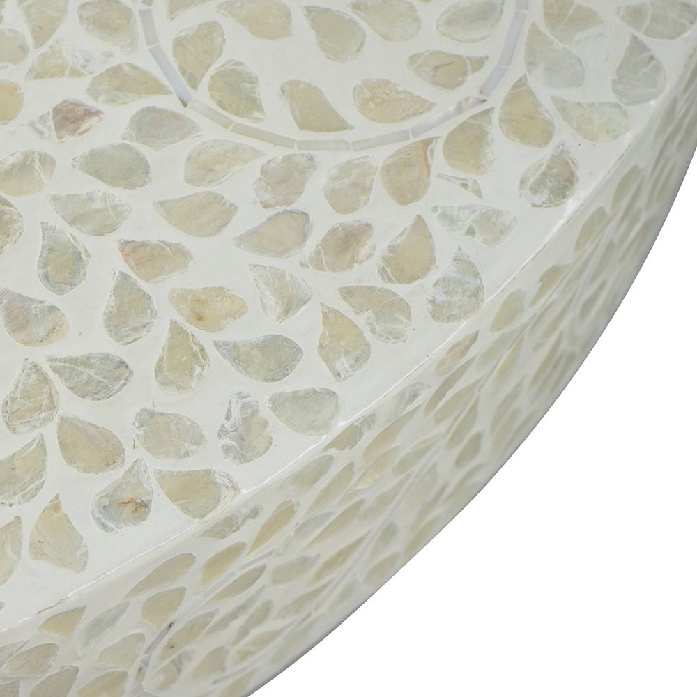 Capiz shell mosaic coffee table with pedestal base, curved round ivory-toned surface on Tampa Home & Garden Store