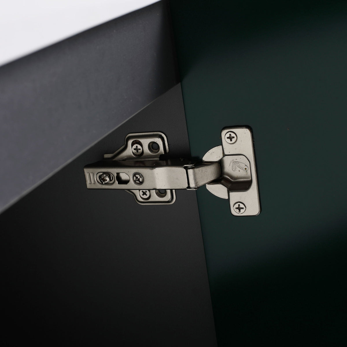 Freestanding bath vanity hinge close-up with dark cabinet panel HouseOfZazla on Tampa Home & Garden Store