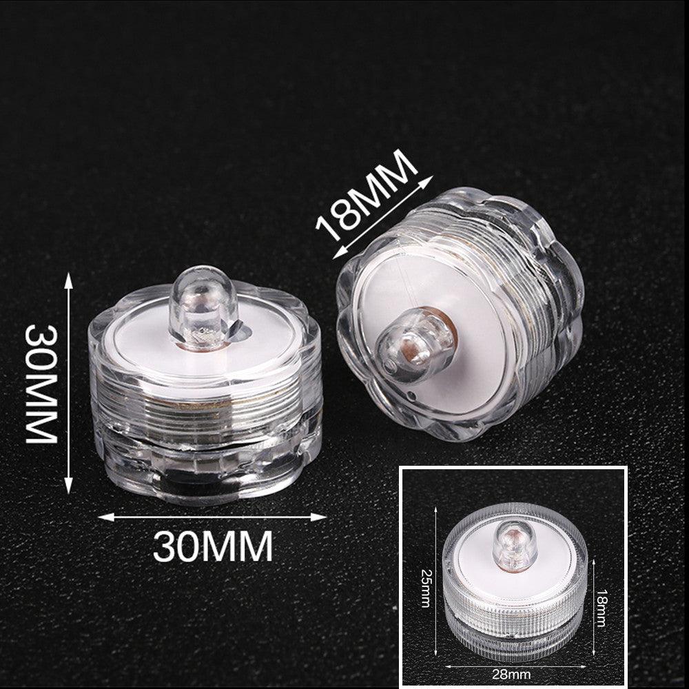 Stevvex flameless LED tea lights, two clear plastic candles with warm white glow, wedding decor on Tampa Home & Garden Store