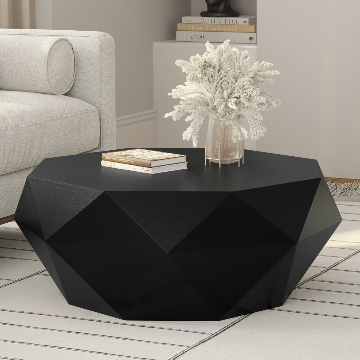 Zayn Coffee Table by HouseOfZazla black geometric faceted surface in a living room on Tampa Home & Garden Store