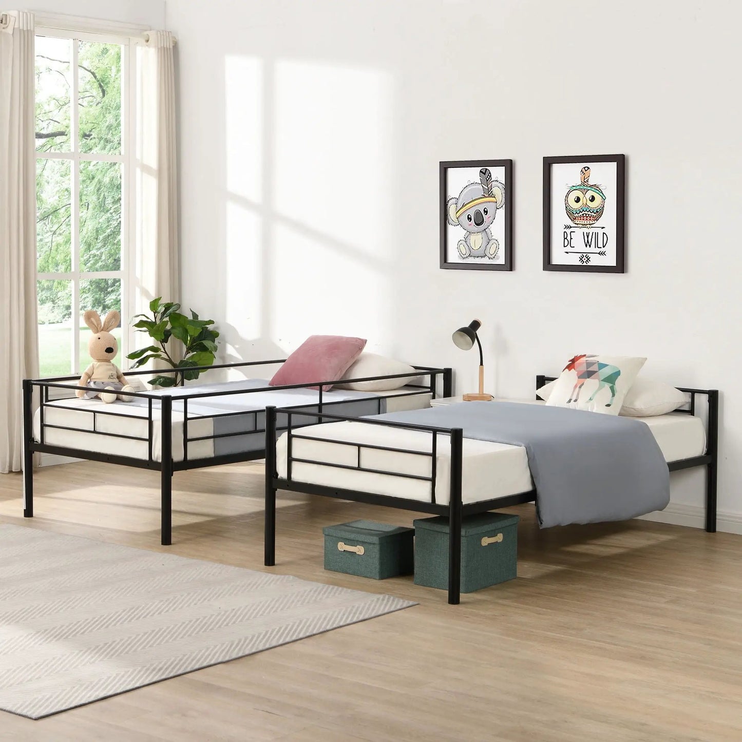 Two black metal bunk bed frames with white mattresses and a trundle, Unique Piece Furniture on Tampa Home & Garden Store