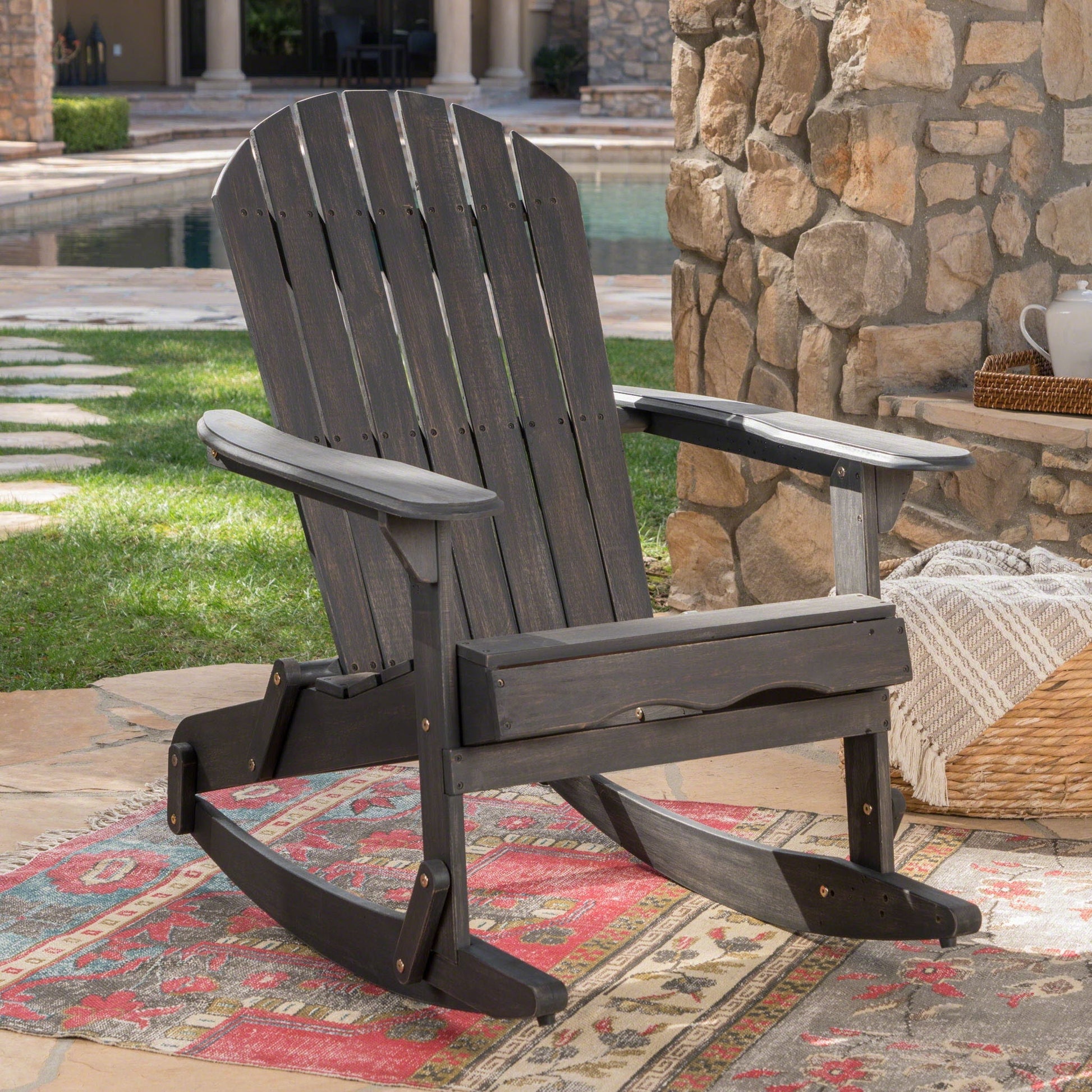 Outdoor Adirondack Rocking Chair by HouseOfZazla in dark stained wood with handcrafted details on Tampa Home & Garden Store