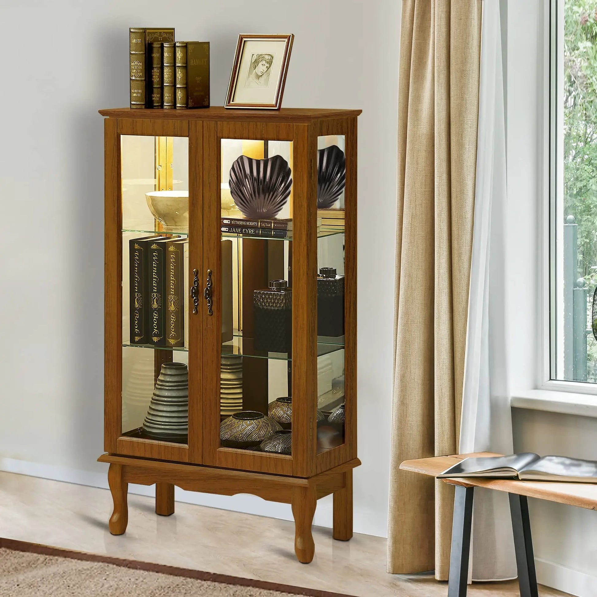 Lighted wooden curio cabinet with three tempered glass doors and adjustable shelves on Tampa Home & Garden Store