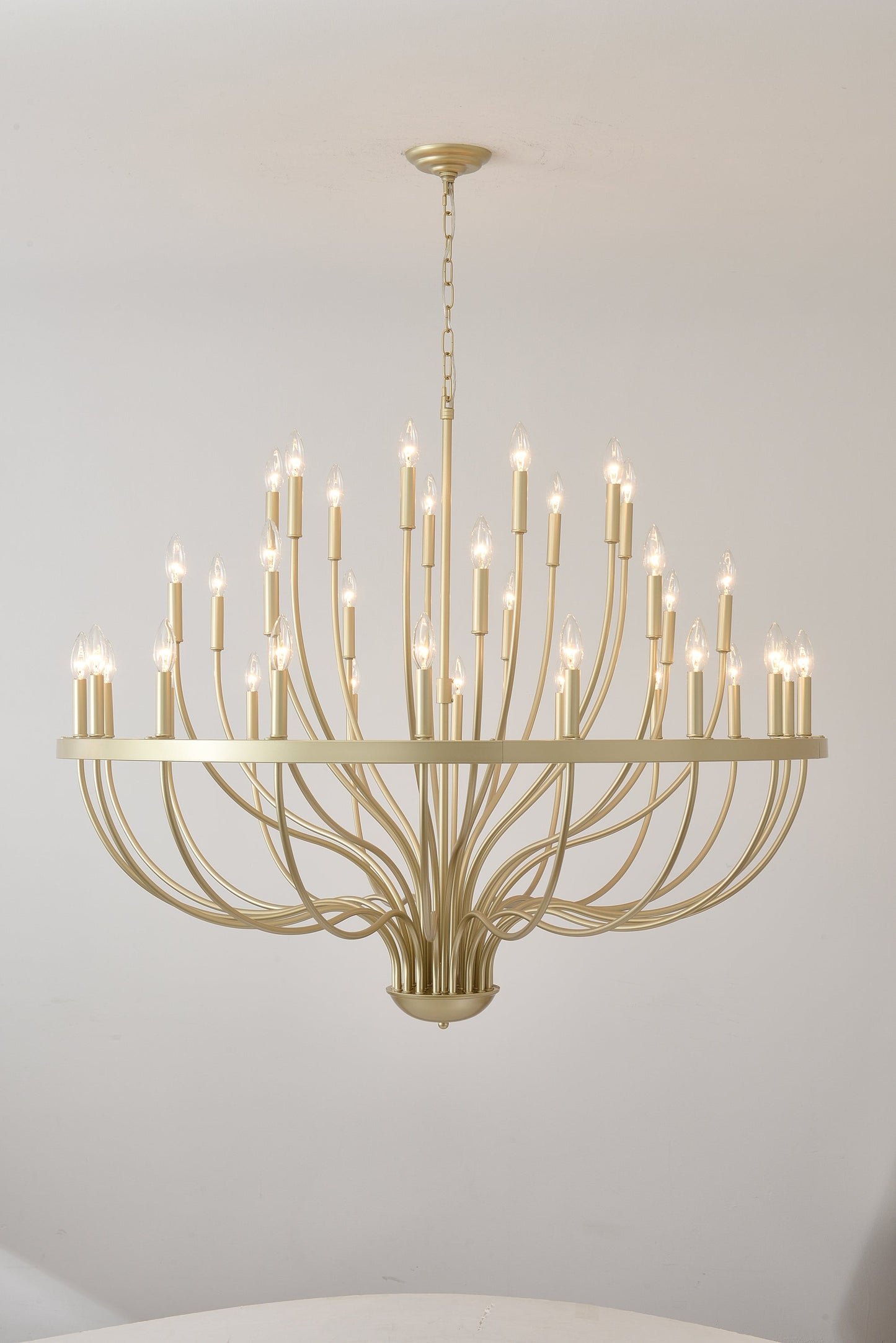 36-Light Gold Industrial Iron Candle Chandelier with curved arms and candle bulbs, chain-hung on Tampa Home & Garden Store